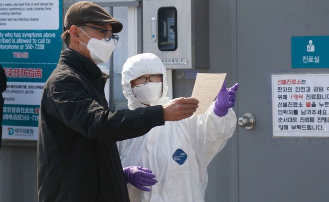 Hàn Quốc: Thêm 52 trường hợp dương tính với virus corona, tổng cộng 82 người đã lây từ bệnh nhân siêu lây nhiễm - Ảnh 2.