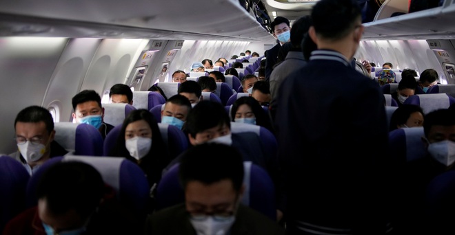 Đại dịch Covid-19 lan rộng không kiểm soát, nhiều du học sinh Trung Quốc bỏ hơn 500 triệu để có 1 chỗ ngồi trên máy bay rời khỏi Mỹ - Ảnh 1.