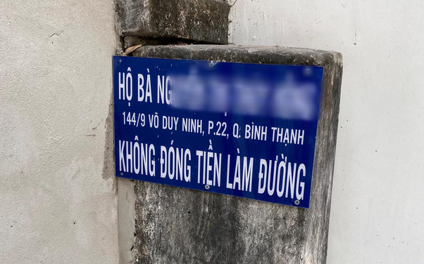 TP.HCM: Một hộ dân bức xúc khi bị bêu rếu tên do "không đóng tiền làm đường"