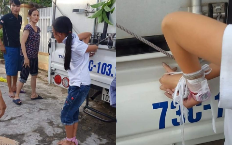 Hình ảnh bé gái 12 tuổi bị mẹ cột chân, trói tay phía sau xe tải vì trộm tiền gây xôn xao