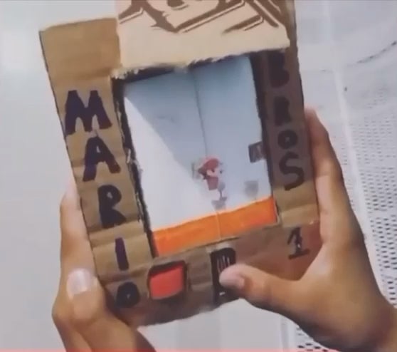 Tự tạo máy game Nintendo chơi Mario huyền thoại chỉ bằng... bìa giấy, cậu bé Venezuela khiến cộng đồng quốc tế thán phục - Ảnh 1.