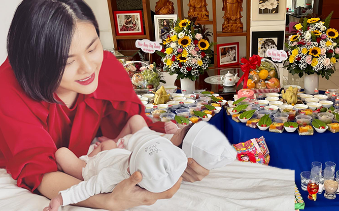 Vân Trang tổ chức đầy tháng cho con, chi tiết trên bánh kem hé lộ thông tin đặc biệt về đôi nhóc tỳ!
