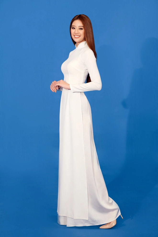 Hoa hậu Khánh Vân mang áo dài, đồ bảo hộ vào hình hiệu Road To Miss Universe 2020 - Ảnh 5.